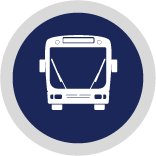 a navy blue icon with a white bus within it